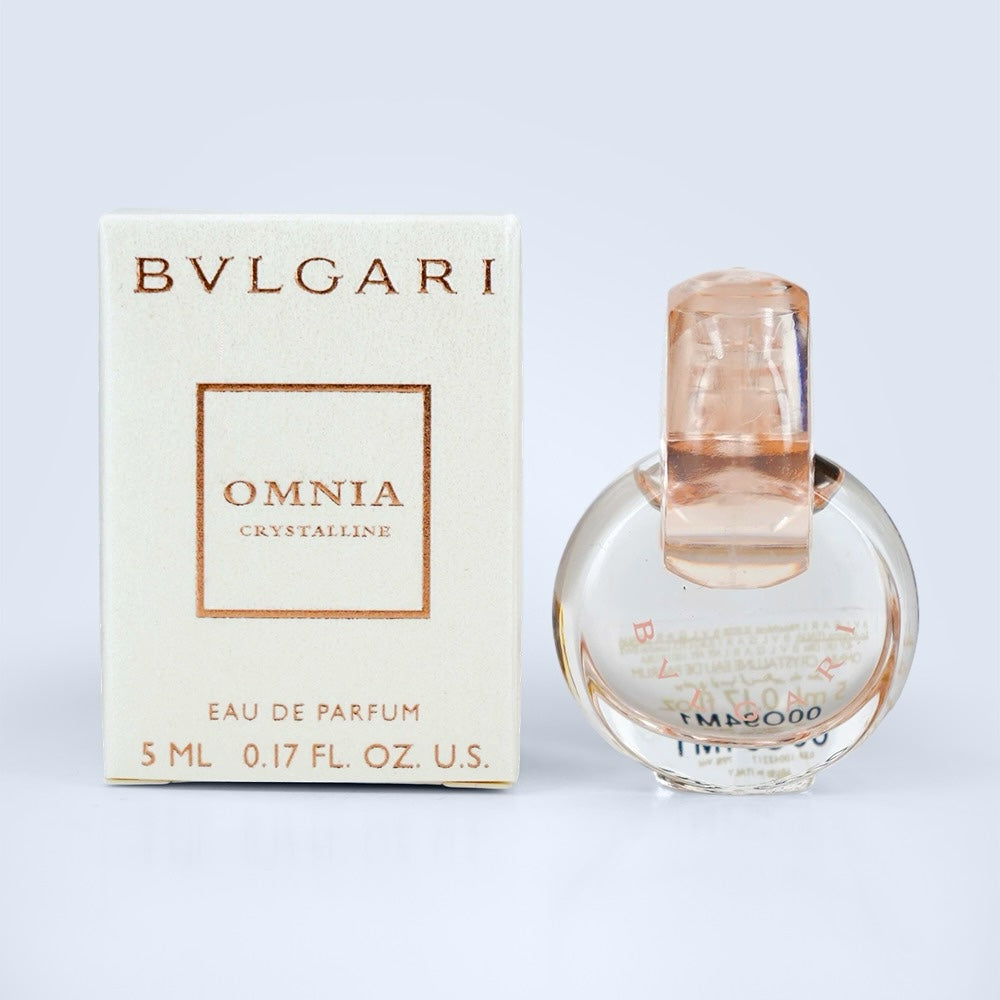 Nevora BVLGARI Omnia Crystalline Eau de Parfum 5ml miniature bottle next to its elegant white and gold box.