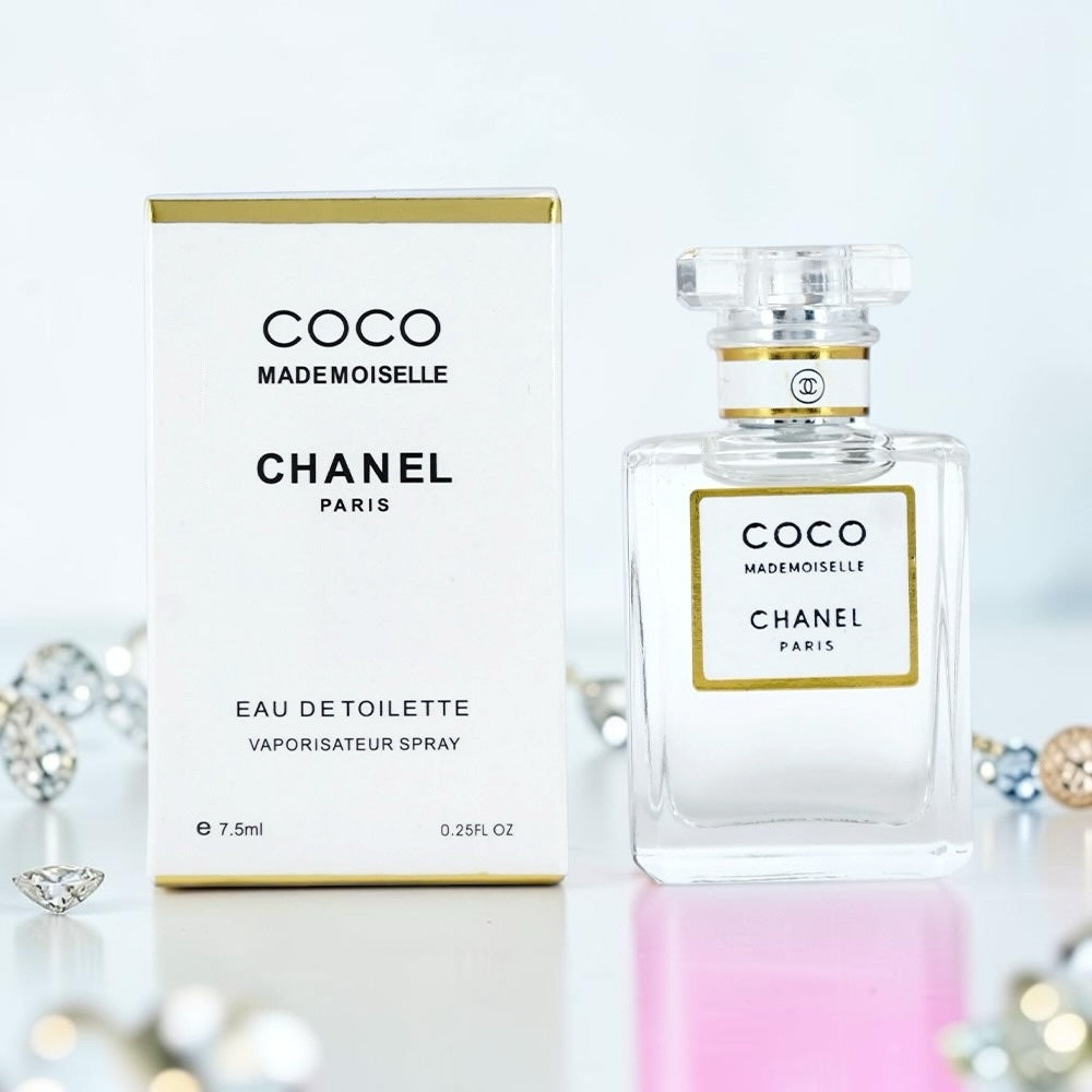 Nevora CHANEL Coco Mademoiselle Eau De Toilette 7.5ml travel spray bottle next to its white and gold box.