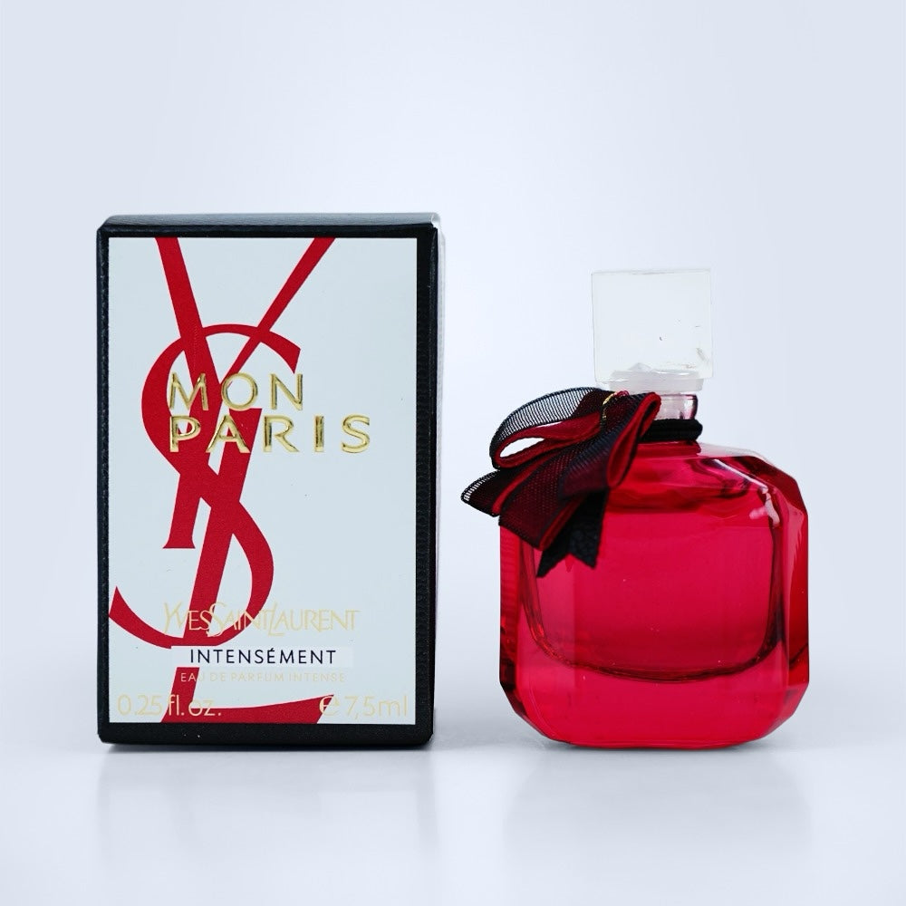 Nevora miniature Yves Saint Laurent Mon Paris Intensément perfume bottle in fuchsia glass with a black bow and box.
